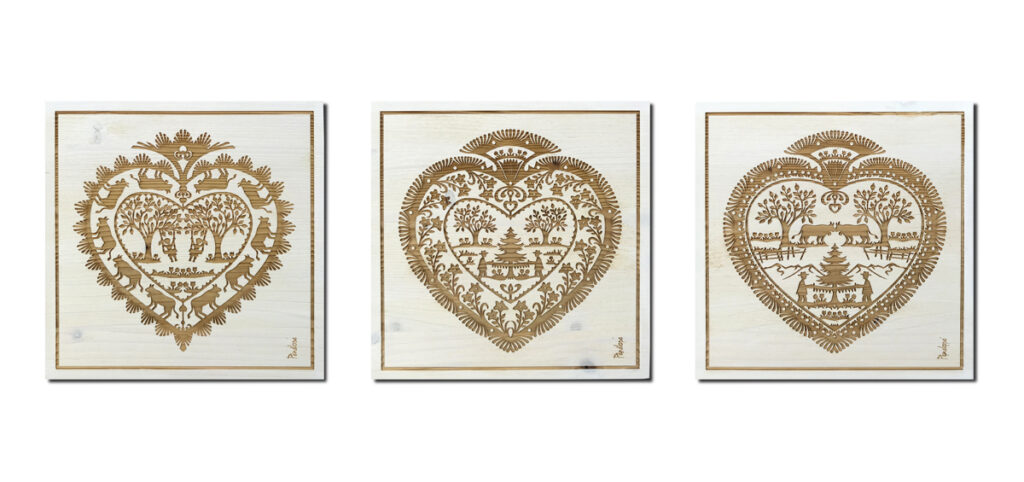 gravure laser sur pin : cœurs dans l'esprit des papiers découpés suisses